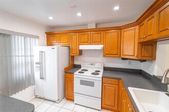 12023 SW 110th St Cir E in Miami, FL - Building Photo - Building Photo