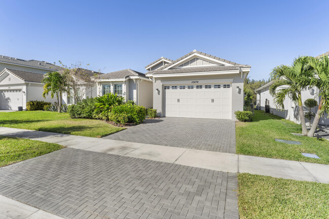 15474 Goldfinch Cir in Westlake, FL - Building Photo - Building Photo