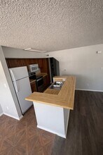 9823 Walnut St, Unit L205 in Dallas, TX - Building Photo - Building Photo