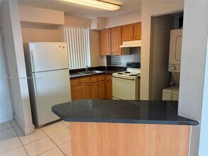 6045 NW 186th St in Miami Gardens, FL - Building Photo - Building Photo