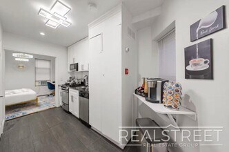Modern 2BR/1BA in Prime Lower Manhattan | Fast Access to Midtown & Google HQ in New York, NY - Building Photo - Building Photo