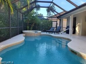 15896 Delaplata Ln in Naples, FL - Building Photo