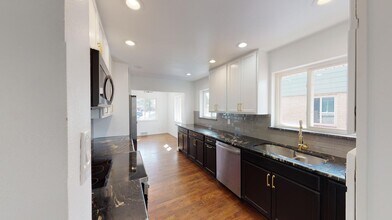 Classic brick Montclair home with covered in Denver, CO - Building Photo - Building Photo