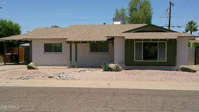 property at 8608 E Highland Ave