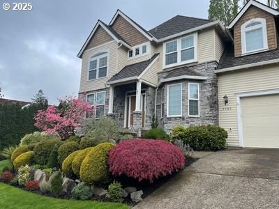 property at 9587 NW Caxton Ln