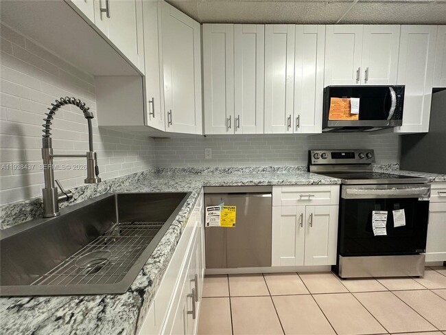 property at 14840 Naranja Lakes Blvd