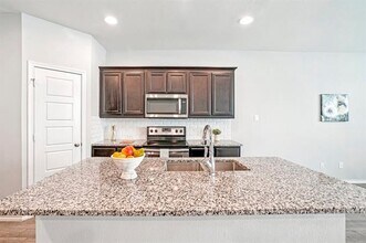 9000 HUXLEY Dr in Providence Village, TX - Building Photo - Building Photo