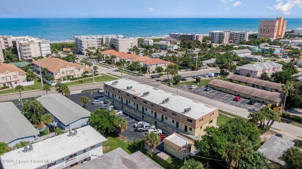7101 Ridgewood Ave, Unit 102 in Cape Canaveral, FL - Building Photo