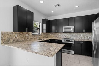830 NE 191st St in Miami, FL - Building Photo - Building Photo