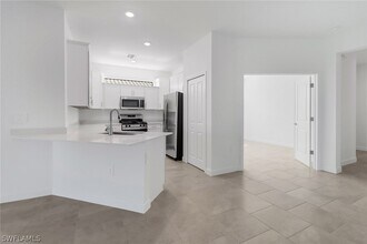 19600 Hinkley Dr in Estero, FL - Building Photo - Building Photo