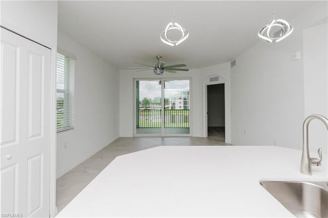 18461 Copperhead Ct, Unit 421 in Lehigh Acres, FL - Building Photo - Building Photo