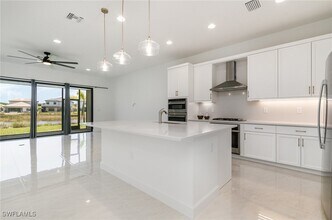 20463 Estero Xing Blvd in Estero, FL - Building Photo - Building Photo