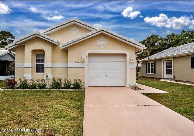 1965 Sundew Ct NE in Palm Bay, FL - Building Photo