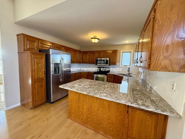 3514 SW Windsong Dr in Lee's Summit, MO - Building Photo - Building Photo