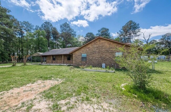 22090 Little Dirt Rd in New Caney, TX - Foto de edificio - Building Photo