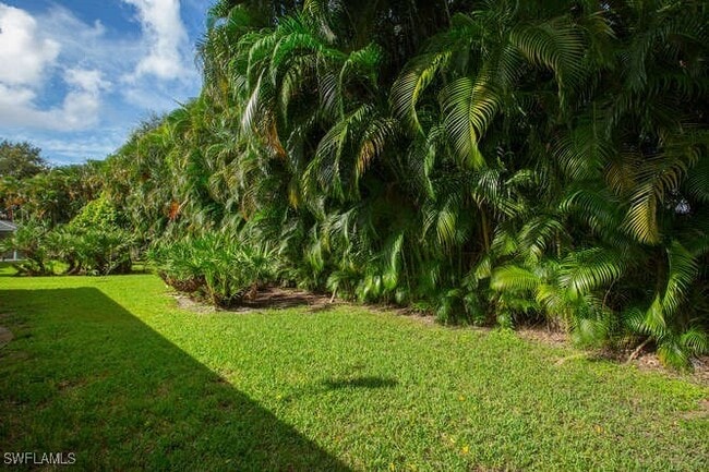 22199 Seashore Cir in Estero, FL - Building Photo - Building Photo