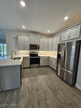 1011 Enbrook Lp in Naples, FL - Building Photo - Building Photo