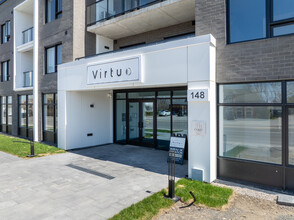 Le Virtuo in Laval, QC - Building Photo - Building Photo