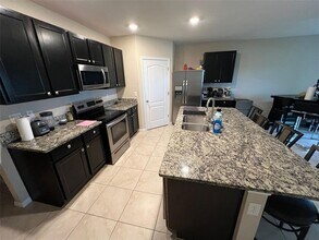 9024 Tuscan Cypress St in Kissimmee, FL - Building Photo - Building Photo
