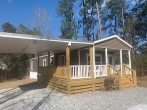 10731 Lilinoe Way in Diamondhead, MS - Foto de edificio - Building Photo