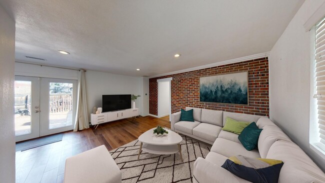 Bright & beautiful South Park Hill duplex property with large fenced shared yard in Denver, CO - Building Photo - Building Photo