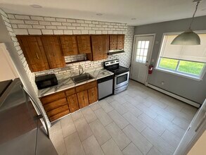 33 Country Greens Dr, Unit 1 in Holtsville, NY - Foto de edificio - Building Photo