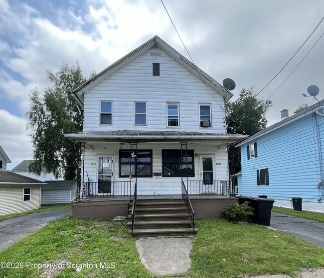 161-163-163 W Parker St