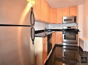 EAST 49 STREET in New York, NY - Building Photo - Building Photo