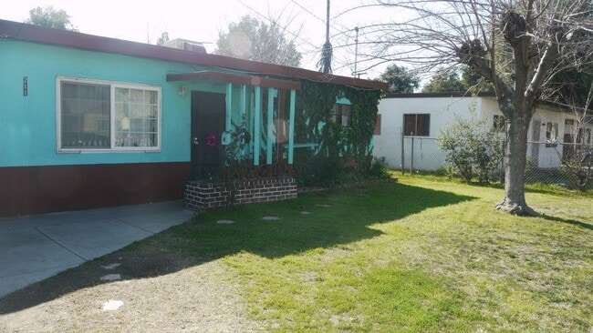 property at 211 E 16th St