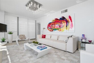 5875 Collins Ave, Unit 12002 in Miami, FL - Building Photo - Building Photo