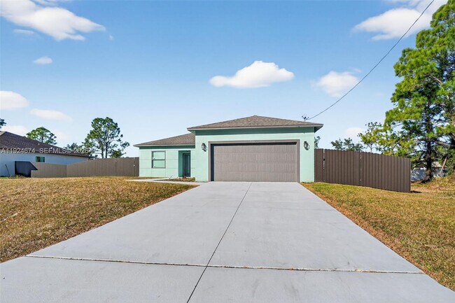710 Bedford Point Ave in Lehigh Acres, FL - Building Photo - Building Photo