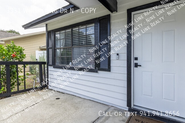 3331 Whispering Dr N in Largo, FL - Building Photo - Building Photo