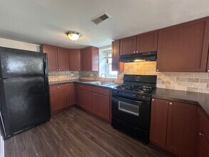 3301 N Ozanam Ave in Chicago, IL - Building Photo - Building Photo