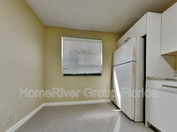 5861 Riverside Dr in Coral Springs, FL - Building Photo - Building Photo