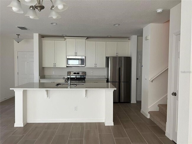 1271 Wispy Cypress Dr in Kissimmee, FL - Building Photo - Building Photo