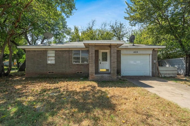 property at 604 E 1st St