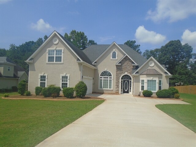 1004 Battersea Pl in Locust Grove, GA - Building Photo