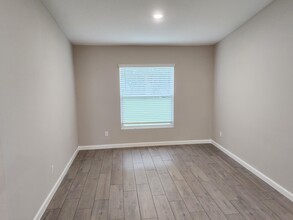 5537 NW Burgin St in Port St. Lucie, FL - Building Photo - Building Photo