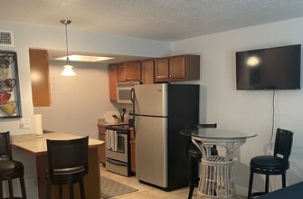 220 Columbia Dr, Unit 319 in Cape Canaveral, FL - Building Photo - Building Photo