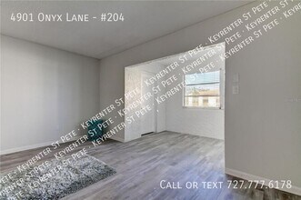 4901 Onyx Ln-Unit -#204 in New Port Richey, FL - Building Photo - Building Photo