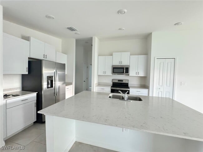 12200 Dakota Ridge Pl in Lehigh Acres, FL - Building Photo - Building Photo