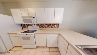 144 Turnbull Villas Cir in New Smyrna Beach, FL - Building Photo - Building Photo