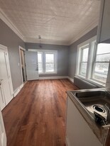 65 Pleasant St, Unit 1-11 in Claremont, NH - Building Photo