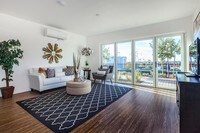 2BR, 1.5BA Penthouse Living Room - Loma 21 Apartamentos in San Diego, California