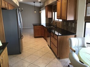 14610 W Ravenswood Dr in Sun City West, AZ - Building Photo - Building Photo