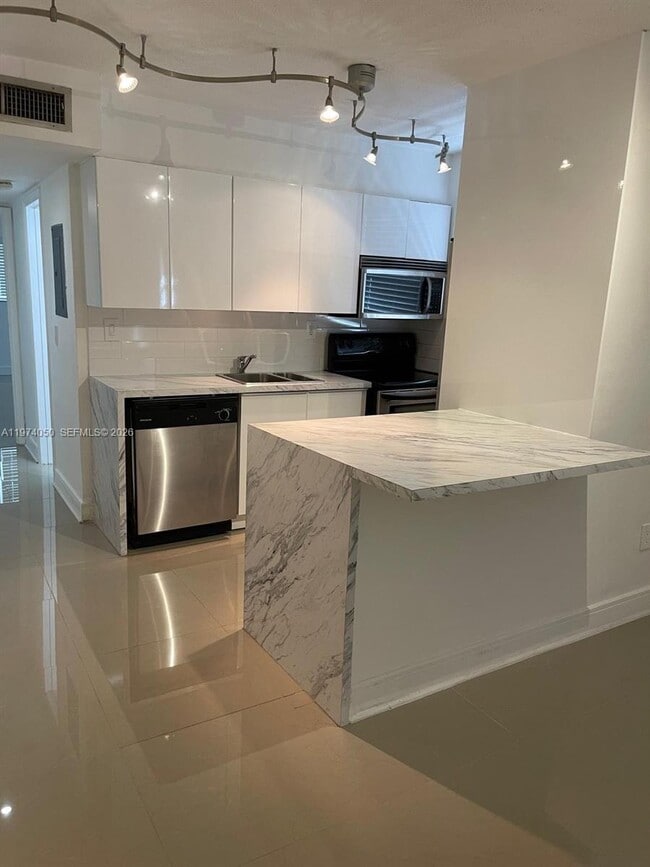 property at 1120 102nd St