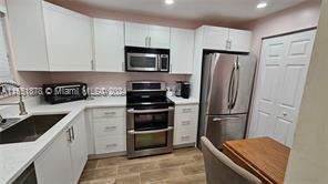 6020 NW 44th St, Unit #407 in Lauderhill, FL - Building Photo