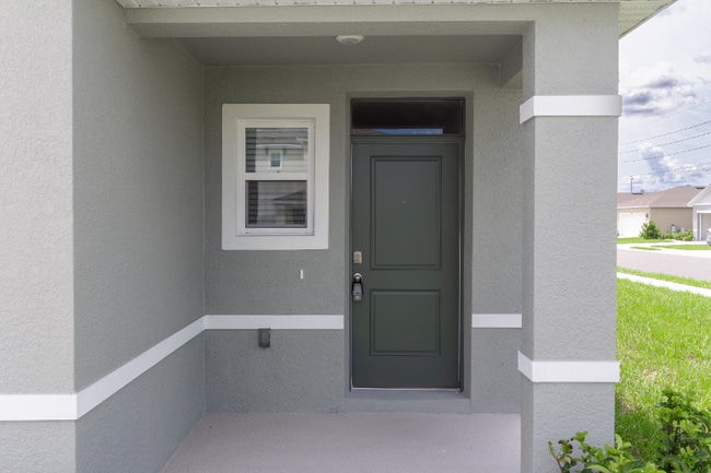 3302 Pine Lily Ave in Poinciana, FL - Building Photo - Building Photo