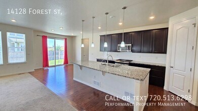 14128 Forest St in Thornton, CO - Building Photo - Building Photo