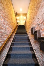 64 E Market St, Unit 202 in Corning, NY - Building Photo - Building Photo